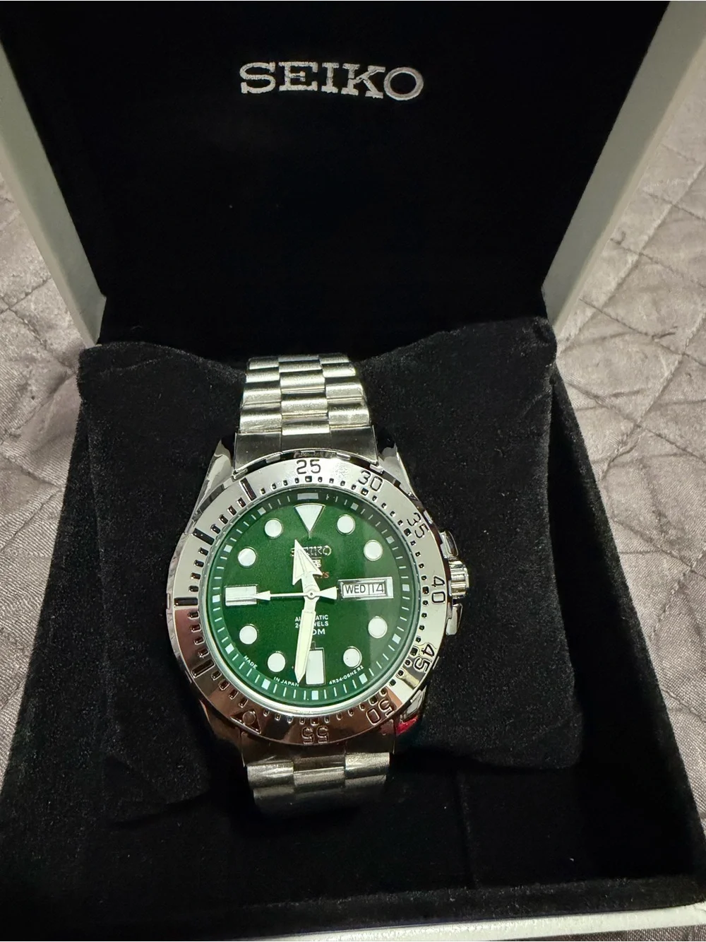 Seiko Stainless Steel Watch with Green Dial and Silver Bezel